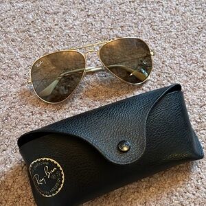 Ray-Ban aviators.